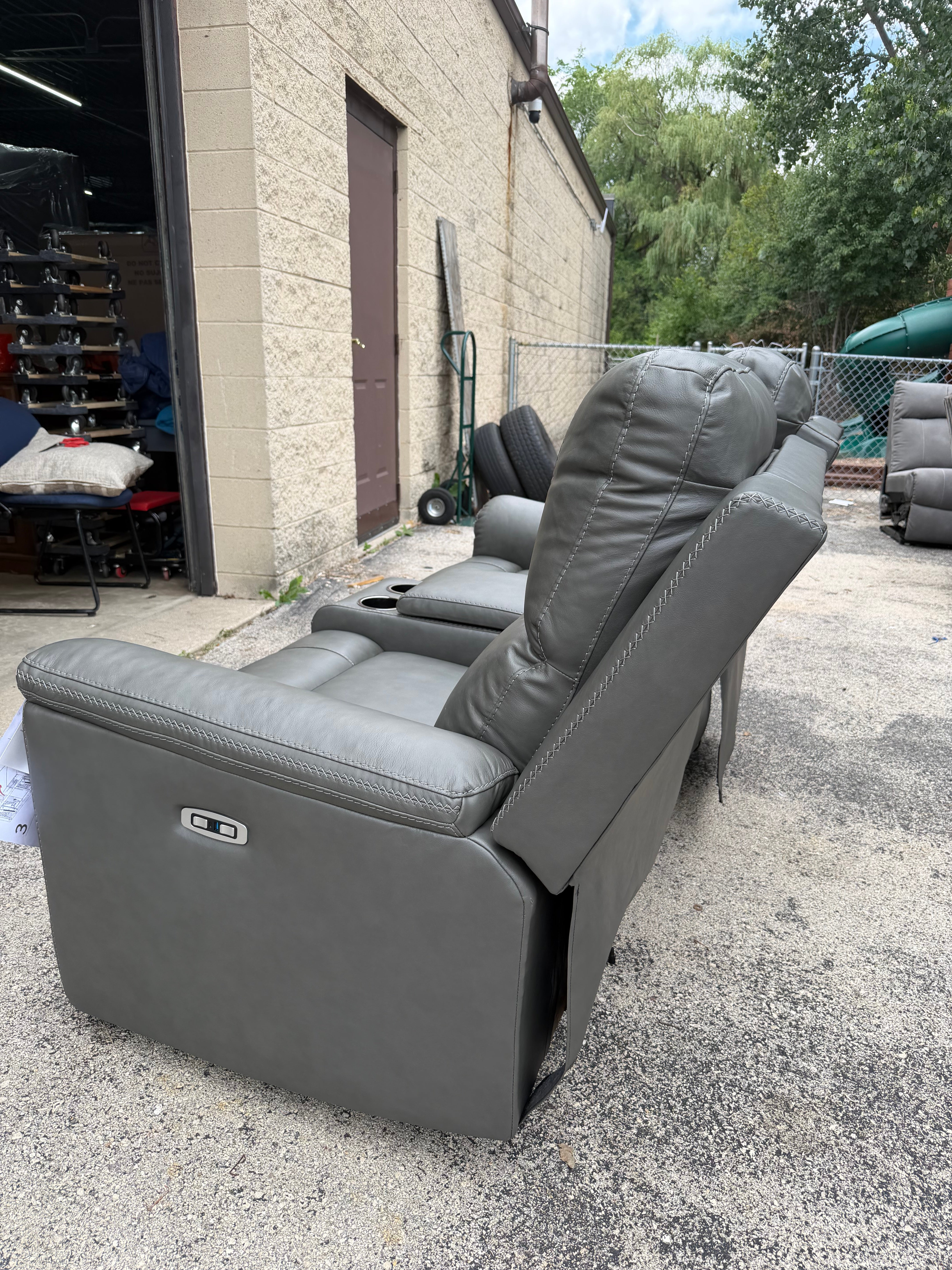 Bleckley Leather Reclining Loveseat - customer return $1800 retail.
